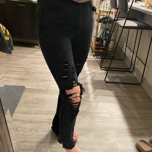 Black ripped flare jeans